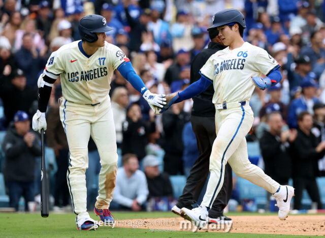 김혜성이 26일 시카고 컵스와 경기서 득점에 성공하고 있다./게티이미지코리아