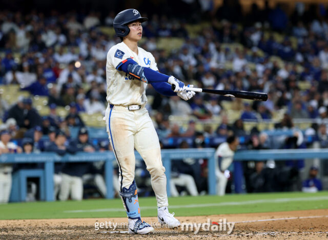 김혜성이 27일 컵스와 경기에서 안타를 기록하지 못했다. 26일 컵스전에서 몸을 푸는 김혜성. /게티이미지코리아