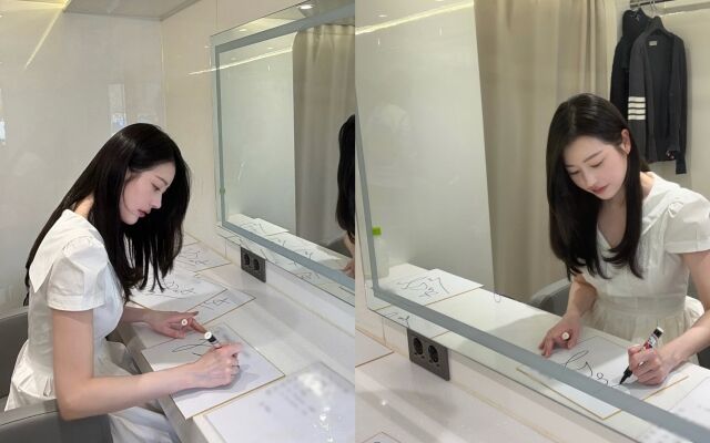 배우 장다아가 사인에 집중 중인 모습. / 장다아 소셜미디어