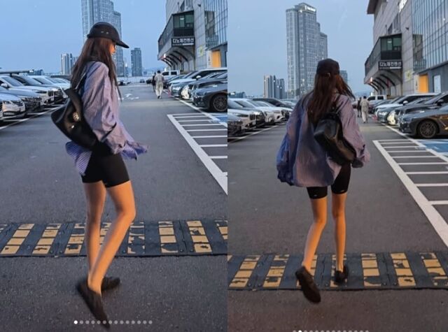 효민은 루즈한 핏의 블루 스트라이프 셔츠에 블랙 바이커 쇼츠를 매치해 하의 실종 패션을 연출, 군살 하나 없는 완벽한 각선미를 더욱 돋보이게 했다./효민 소셜미디어