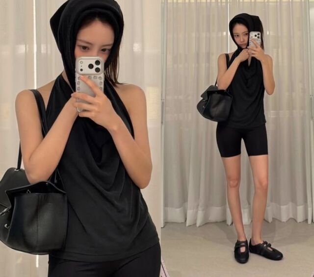 또 다른 실내 거울 셀카 사진에서 효민은 홀터넥 스타일의 블랙 탑을 착용해 어깨 라인과 수려한 쇄골 라인까지 과감하게 드러내며 고혹적인 매력을 더했다. /효민 소셜미디어