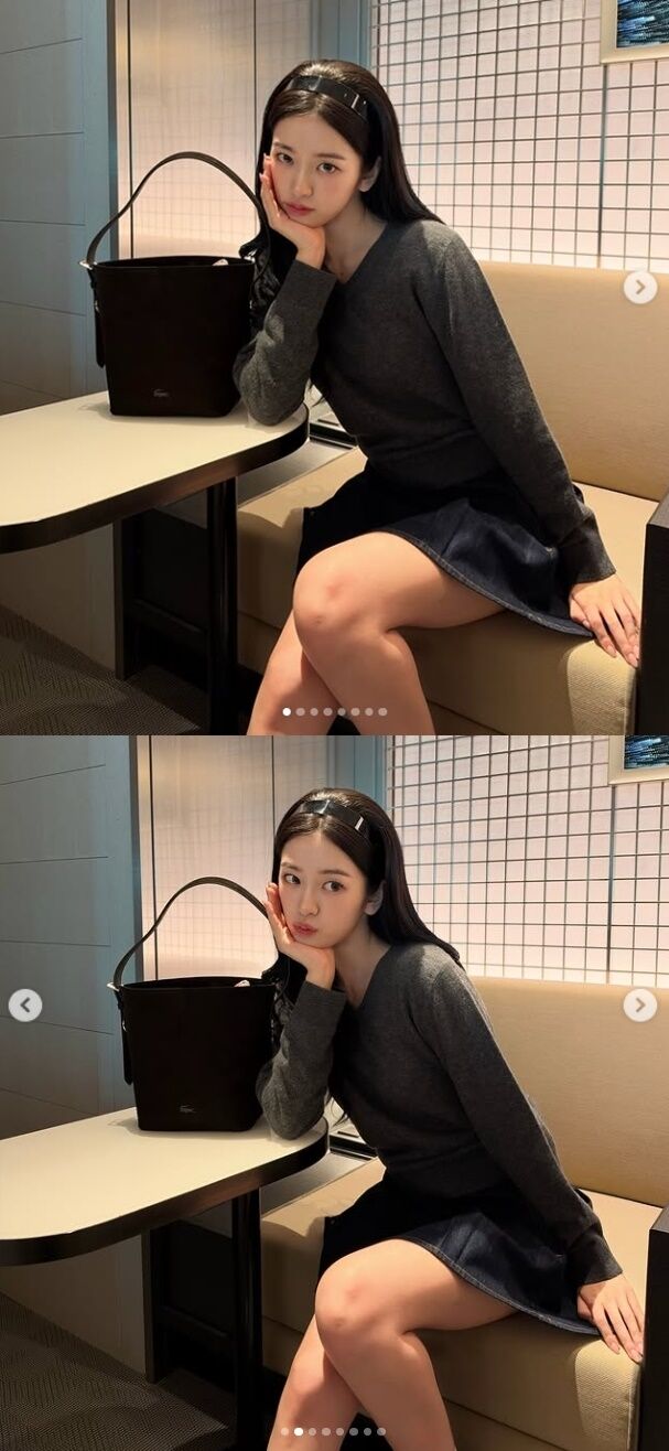 안유진은 짧은 스커트 아래로 드러난 탄탄하고 건강미 넘치는 꿀벅지와 곧게 뻗은 각선미는 시크한 보스턴백과 어우러져 독보적인 비율을 완성했다. /안유진 소셜미디어
